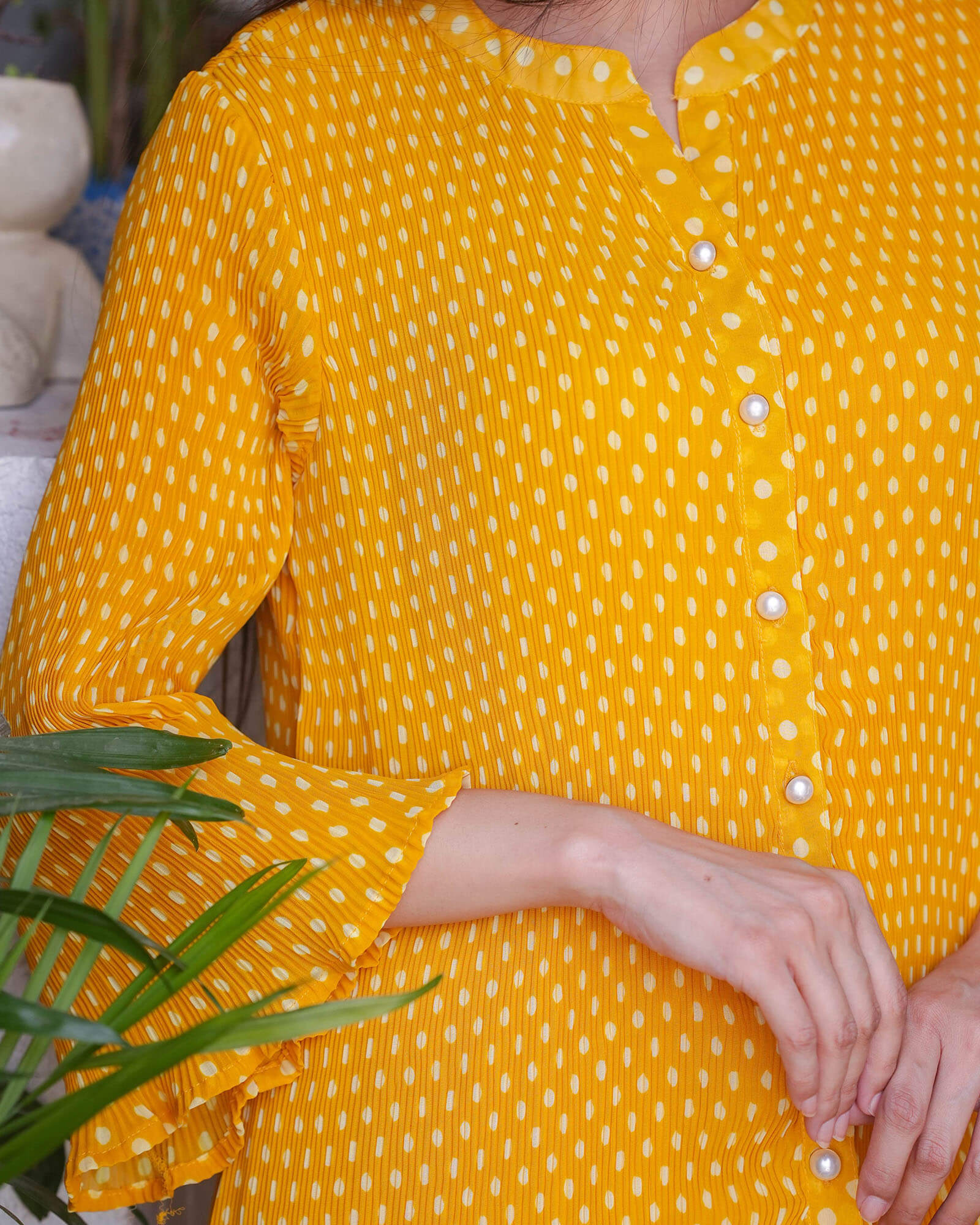 mustard yellow polka dot top