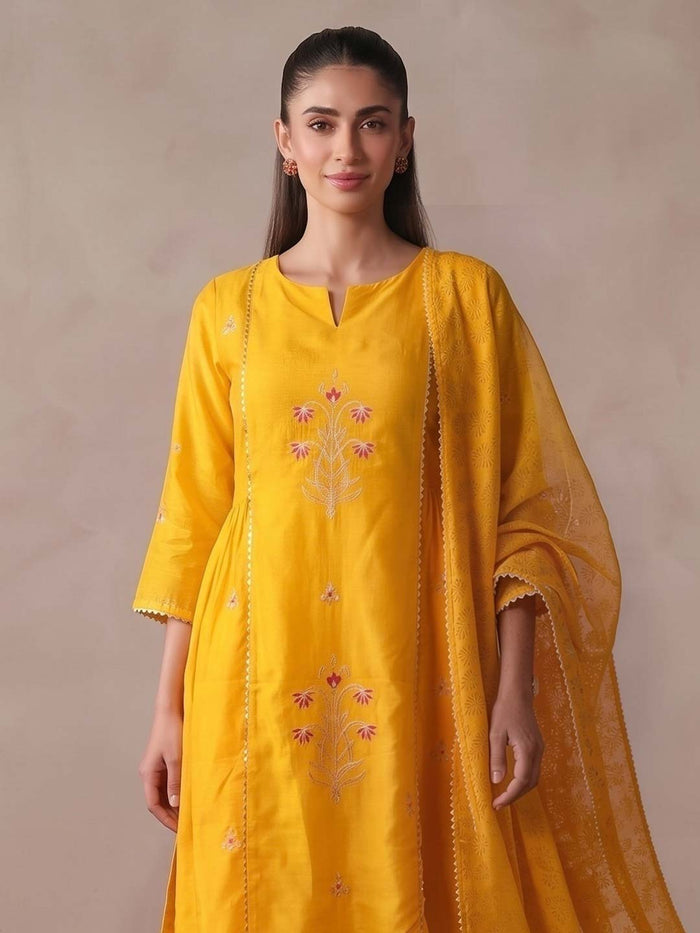YELLOW CHANDERI SUIT SET WITH PITTAN WORK