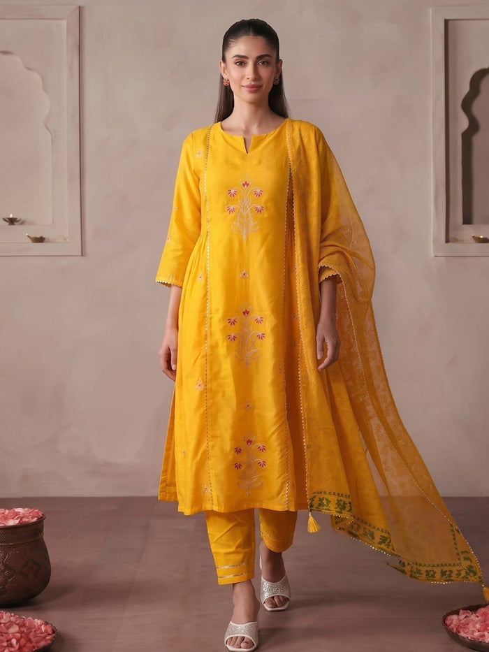 YELLOW CHANDERI SUIT SET WITH PITTAN WORK