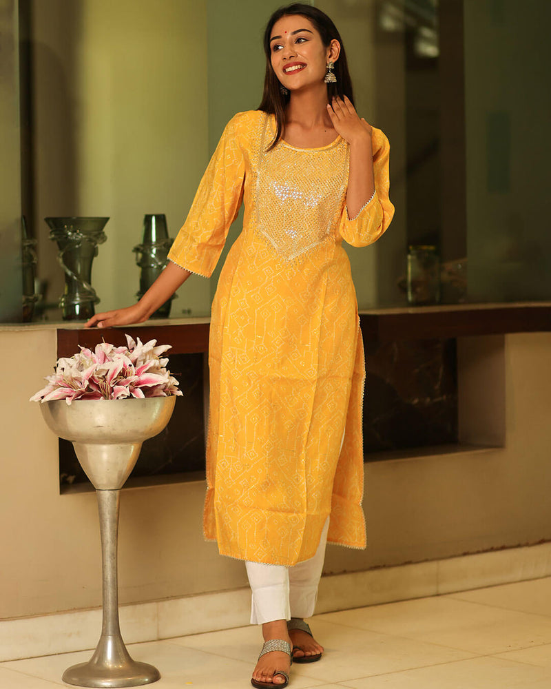YELLOW MUSLIN KURTA WITH GOTTA WORK