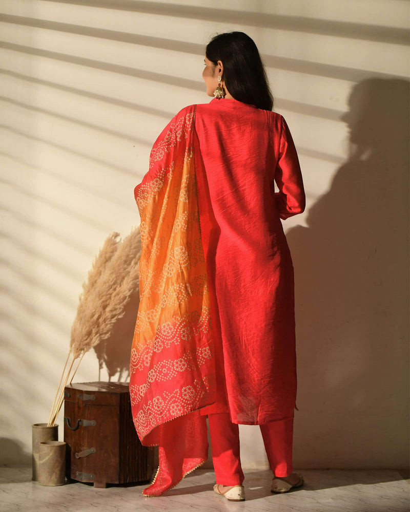 ORANGE MUSLIN SUIT SET WITH BANDHEJ DUPATTA